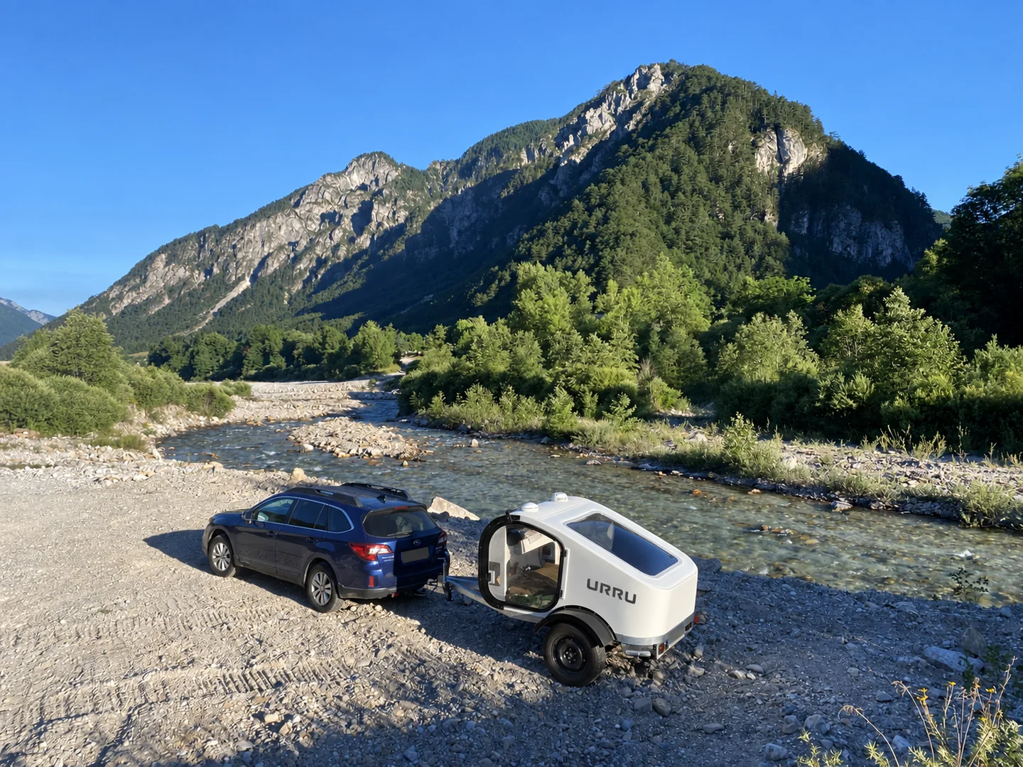 URRU travelling beside a mountain river